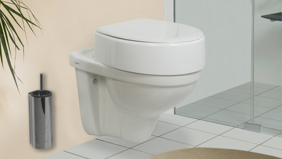 WC mit Toilettensitzerhöhung (Fa. Spahn Reha)