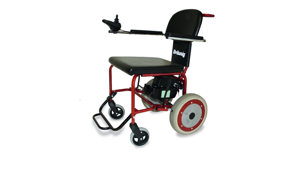 E-Rollstuhl für den Innenbereich, mit vier Rädern, Motor unter Sitz/Rückenlehne, Steuerung (Joystick) an rechter Armlehne, Fußstütze