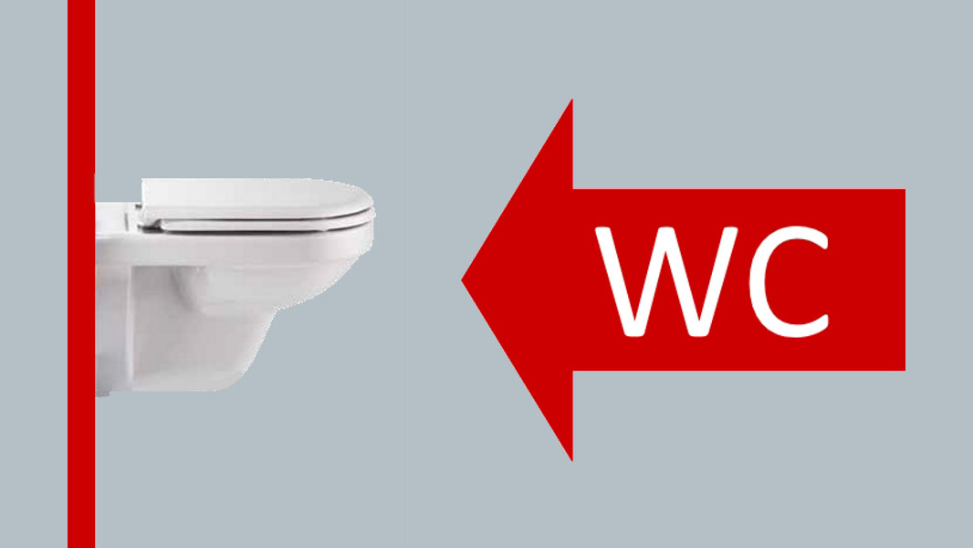 Ein dicker roter Pfeil mit der Aufschrift Pfeil weist auf ein WC.